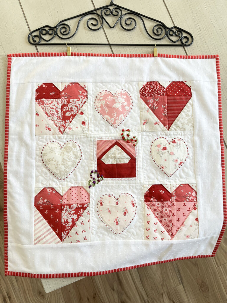Finished stitched hearts quilt.