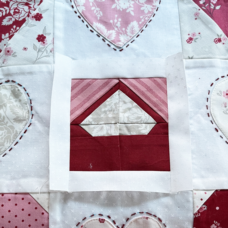 Add borders to a replacement quilt block.
